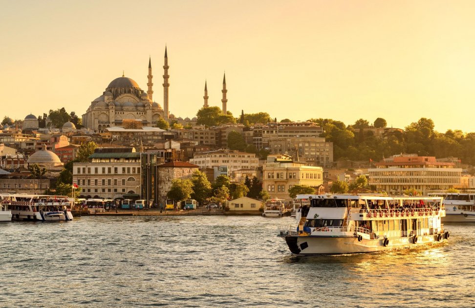 A ferry is sailing along the Golden Horn in Istanbul