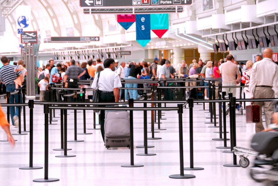 Passengers at the check-in counter at the airport