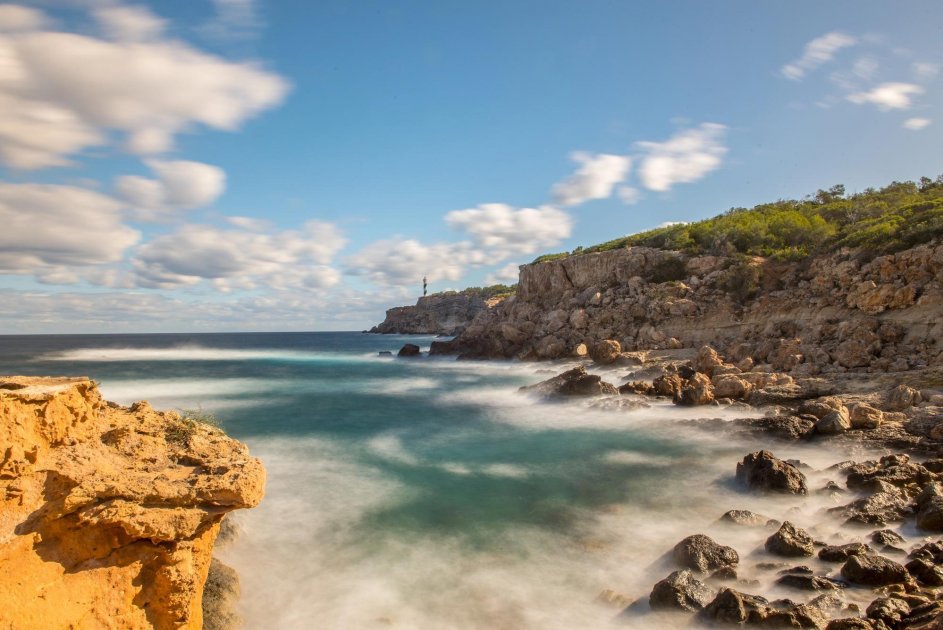 The northern coast of Ibiza with the Moscarter Lighthouse