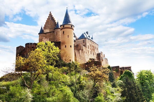 Vianden Castle on a cliff above the Ur River