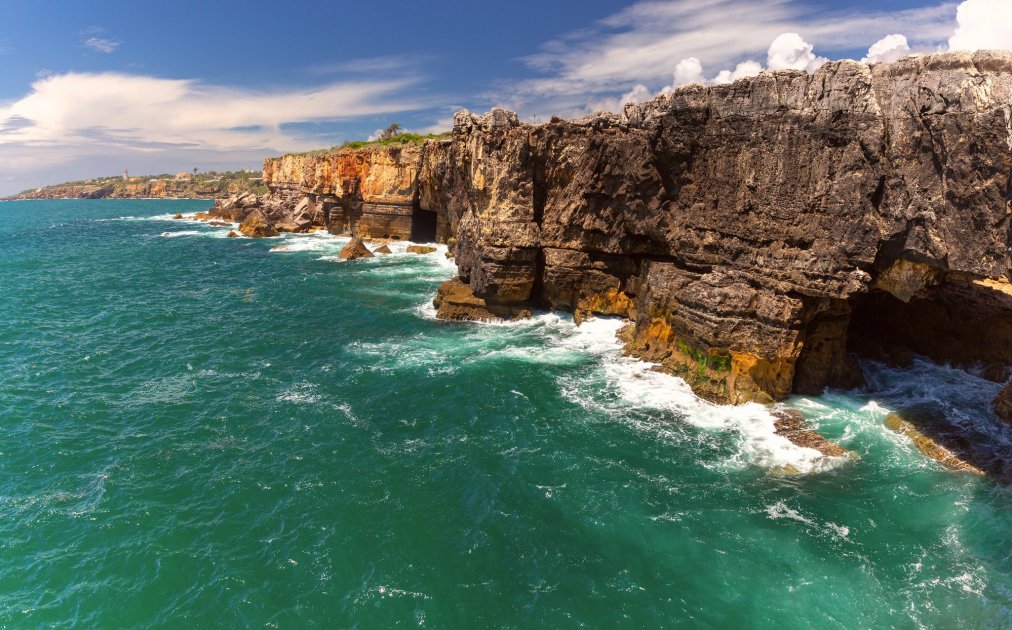 The dramatic cliffs and trails along the Kashkaish coast