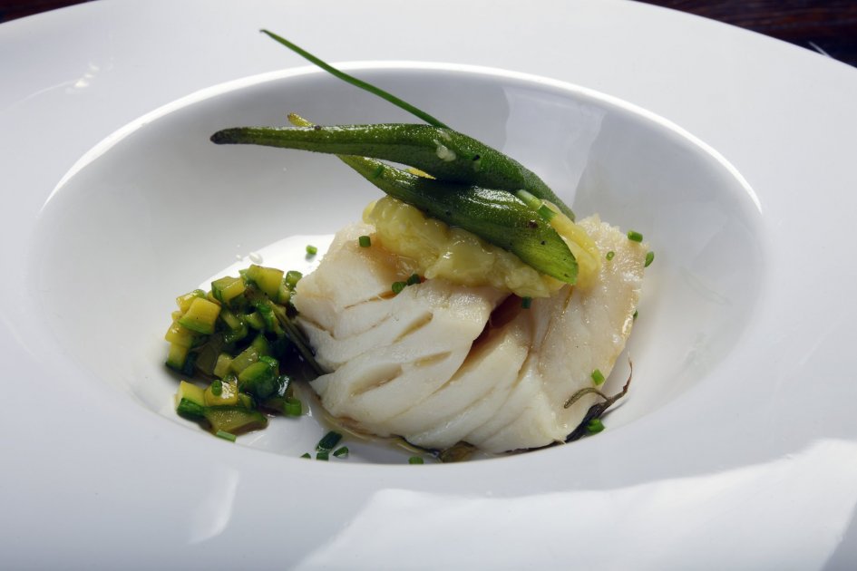 A restaurant serving Portuguese delicacies with a view of the sea