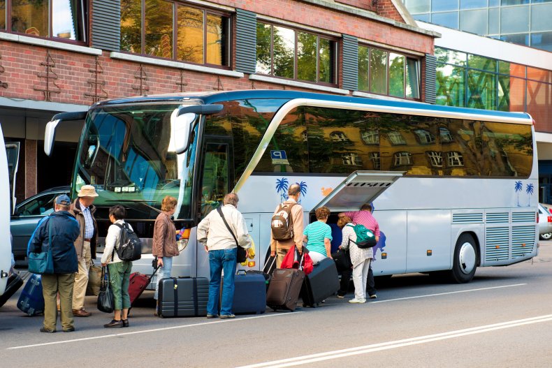 Bus for tourists transportation and group of tourists
