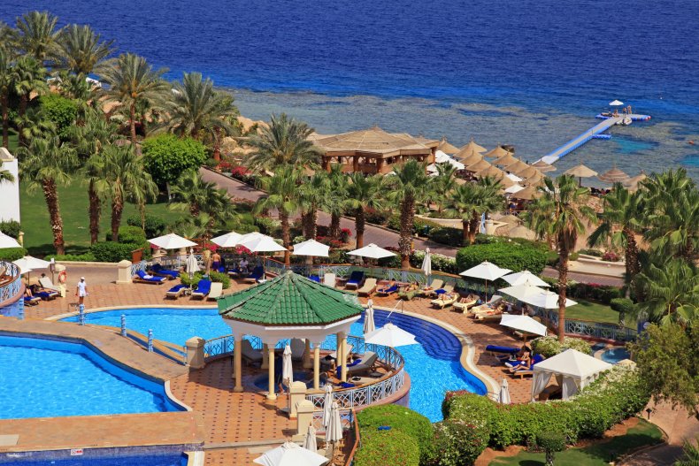 SHARM EL SHEIKH, EGYPT - MAY 3, 2014: Beautiful sea view with pool and beach at a tropical luxury resort hotel on the Red Sea in Sharm El Sheikh, Egypt. - Photo 