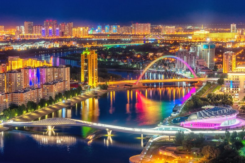 A night view of Astana with its skyscrapers lit up