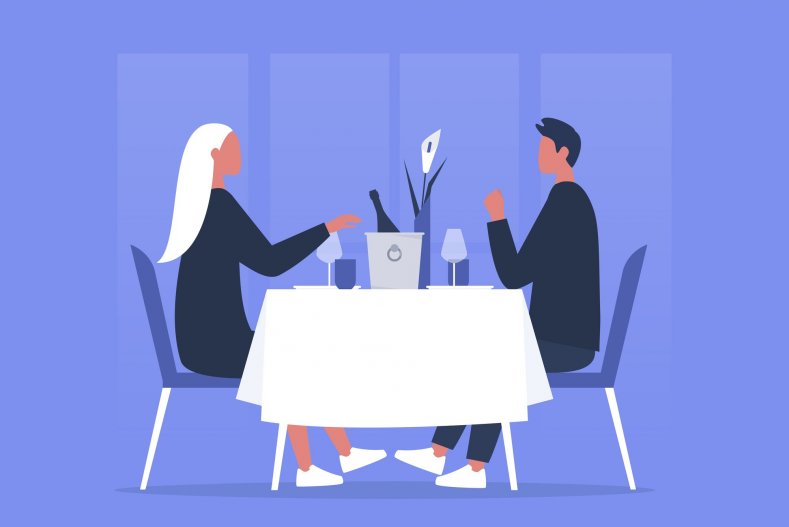 Una cena romántica a la luz de las velas en un restaurante con unas bonitas vistas de la ciudad
