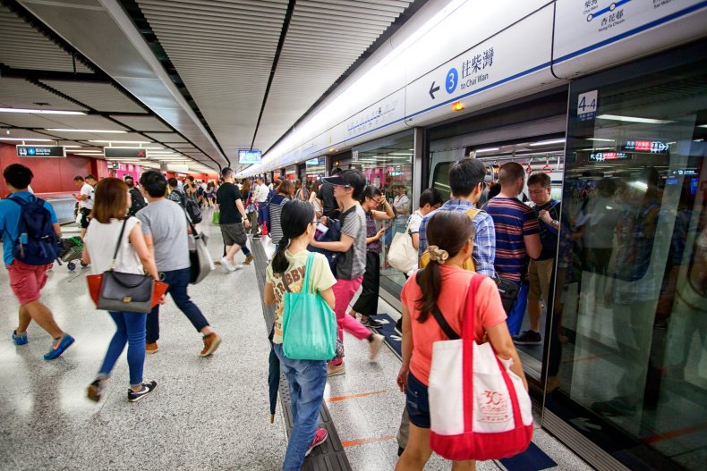 A crowded subway car filled with passengers during rush hour—places where you need to be careful